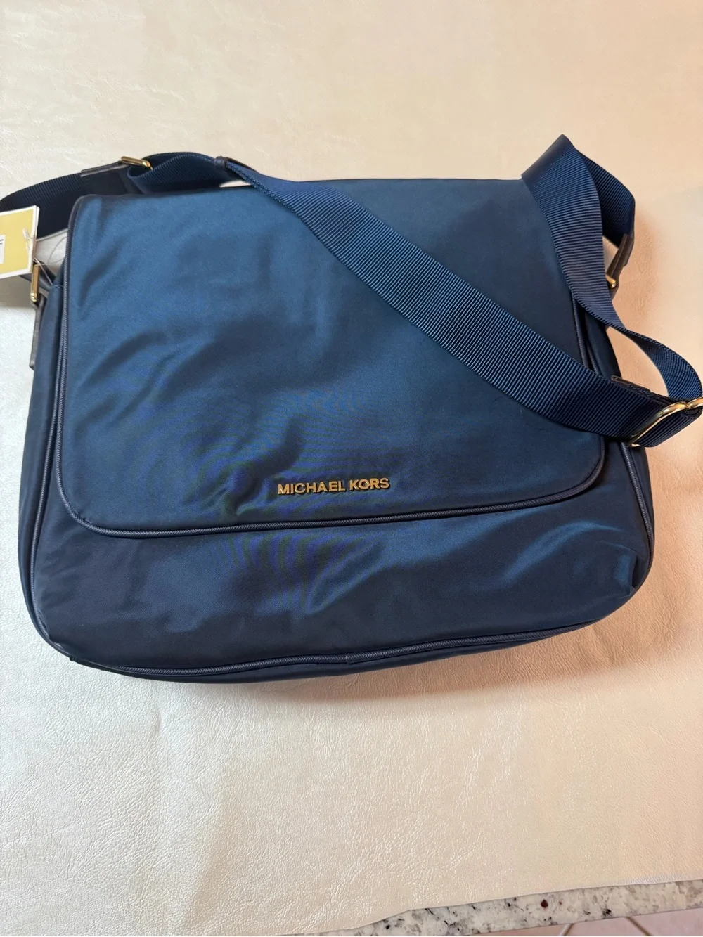 Michael Kors Navy Messenger Bag with Gold Logo